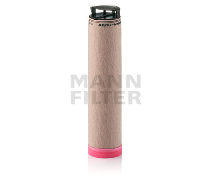 A cylindrical Mann Filter replacement cartridge with a beige filter body, a black top cap, and a pink bottom seal, shown on a white background with a faint brand watermark.