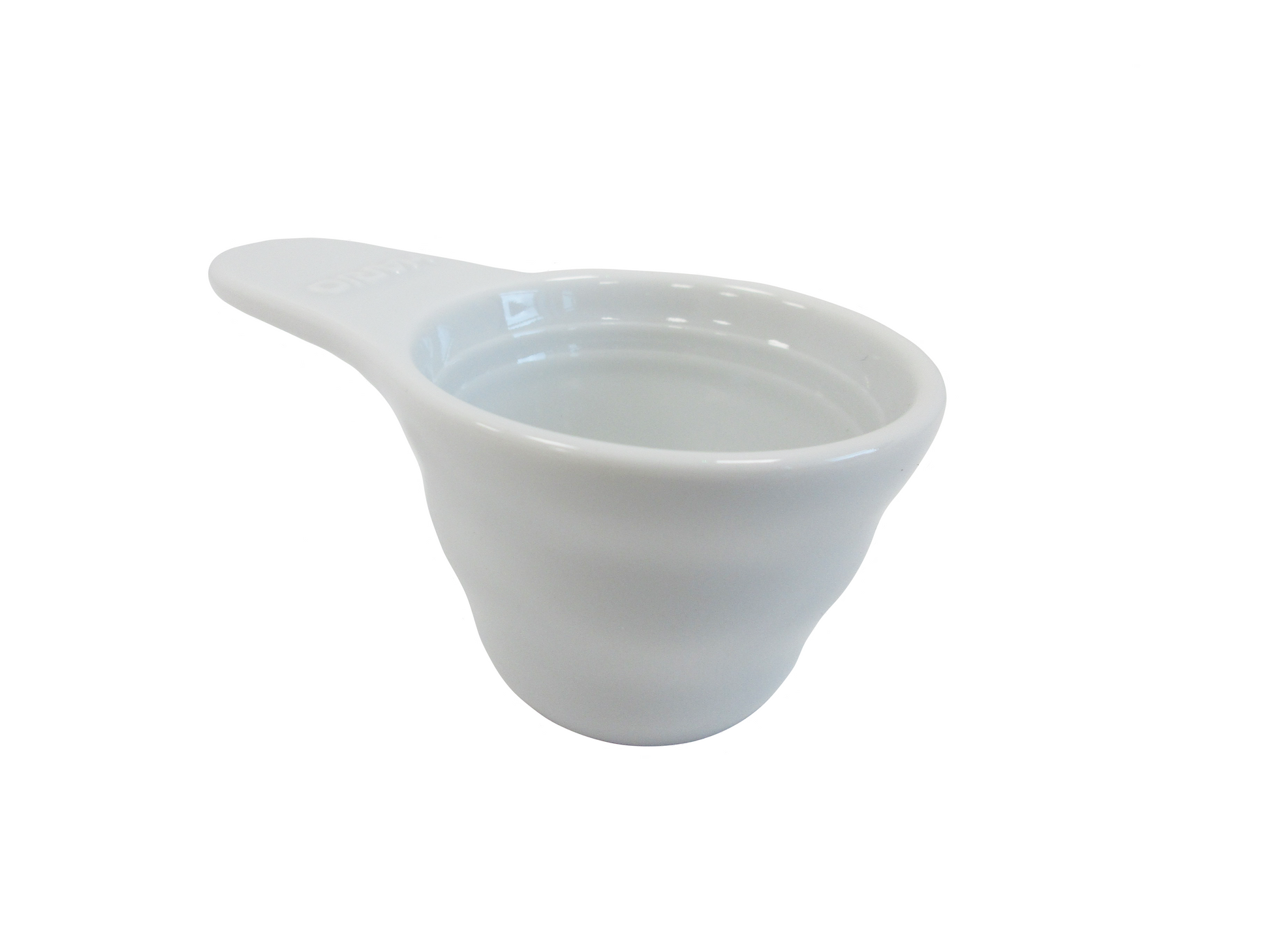A white ceramic measuring scoop with a handle, shown from a three-quarters angle on a solid white background.