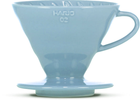 A light blue ceramic pour-over coffee dripper, featuring the embossed brand name 'HARIO 02' on the front, set against a plain white background.