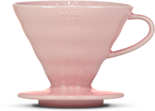 A light pink ceramic pour-over coffee dripper, featuring the embossed brand name 'HARIO 02' on the front, set against a plain white background.