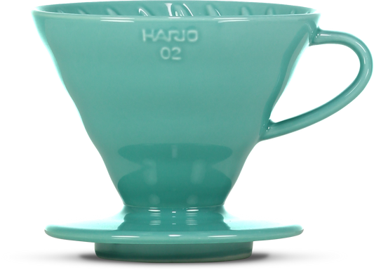A light green ceramic pour-over coffee dripper, featuring the embossed brand name 'HARIO 02' on the front, set against a plain white background.