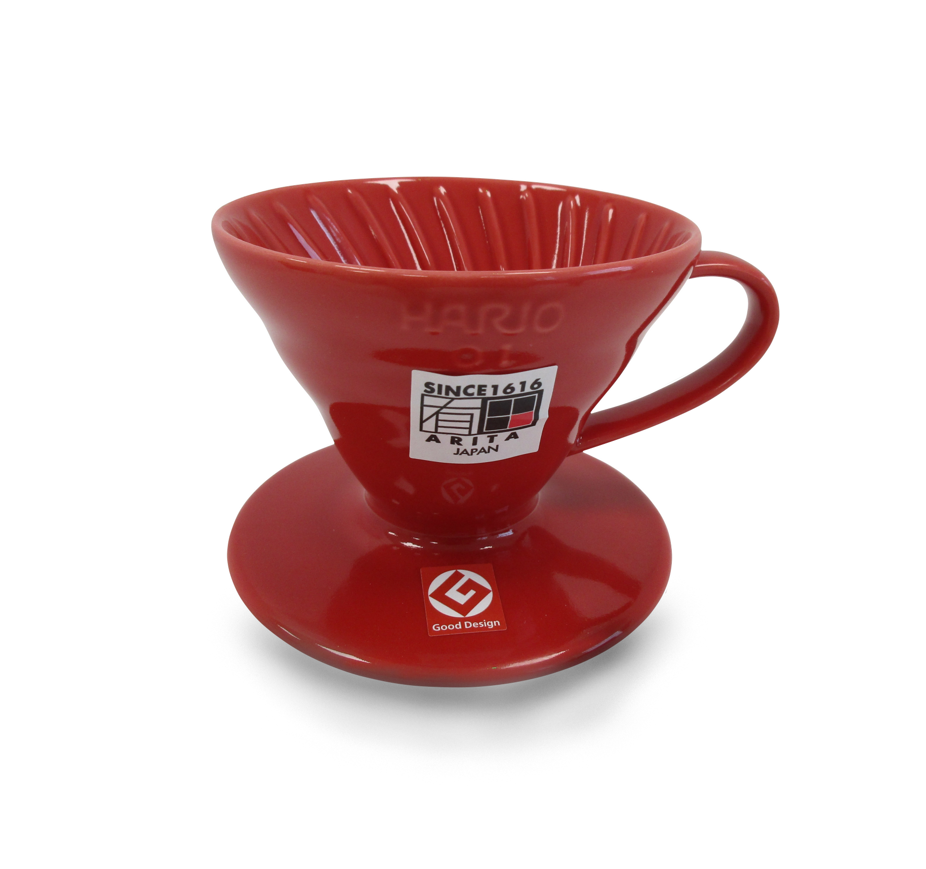 A red ceramic pour-over coffee dripper, featuring the Hario V60 logo and a white brand sticker on the front, set against a plain white background.