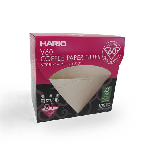 A box of HARIO V60 Coffee Paper Filter No. 01, featuring a magenta and black packaging design with a graphic of the beige paper filter cone.
