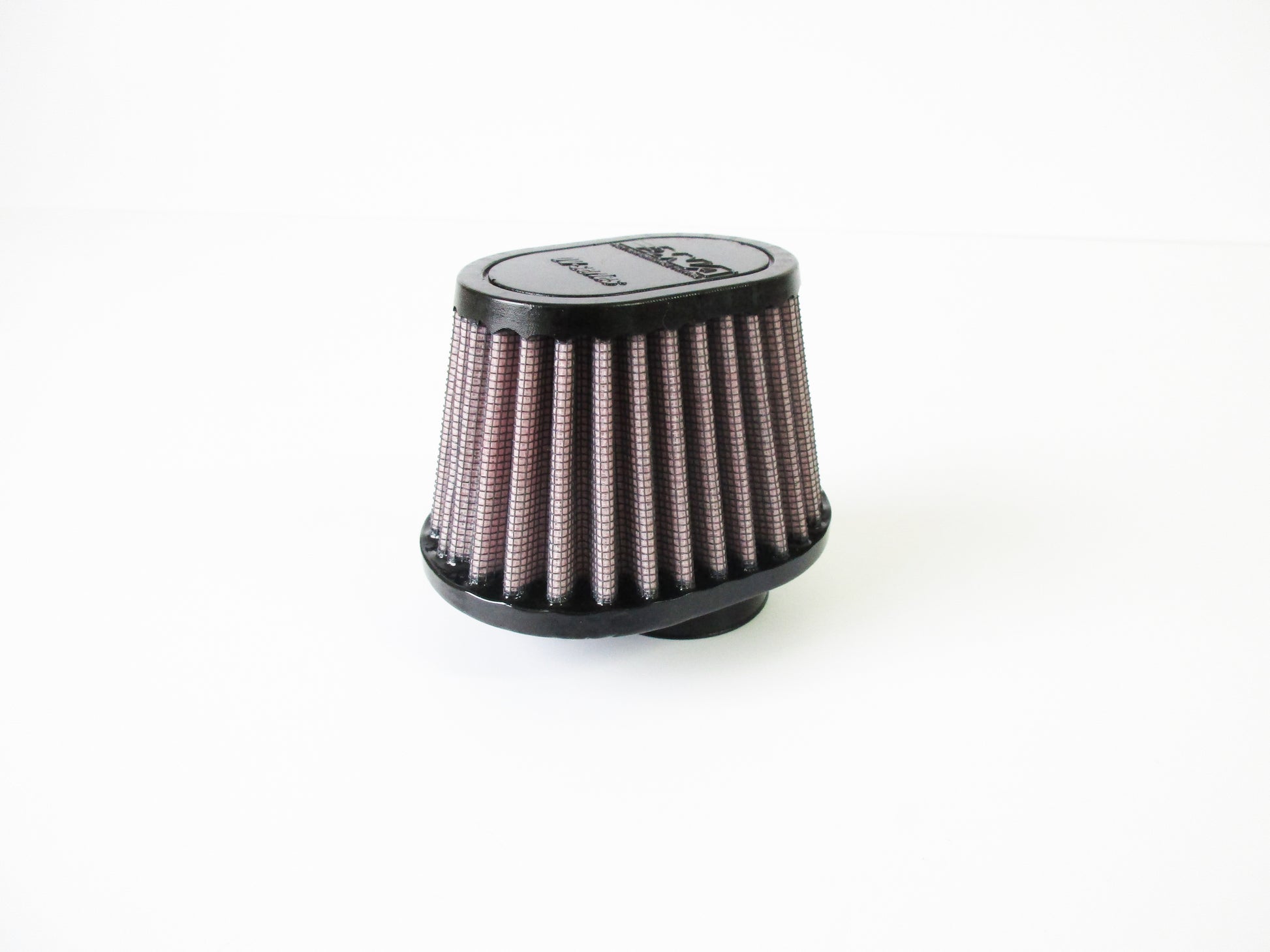 A small cylindrical universal air filter, with a black top cap and pleated filter media, photographed on a plain white background.