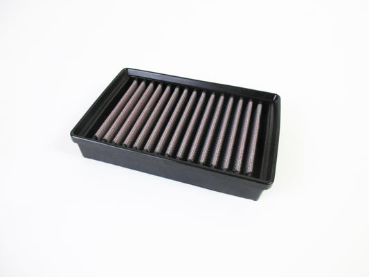 A rectangular motorcycle air filter with a black PU frame and pleated red filter media, shown on a plain white background.
