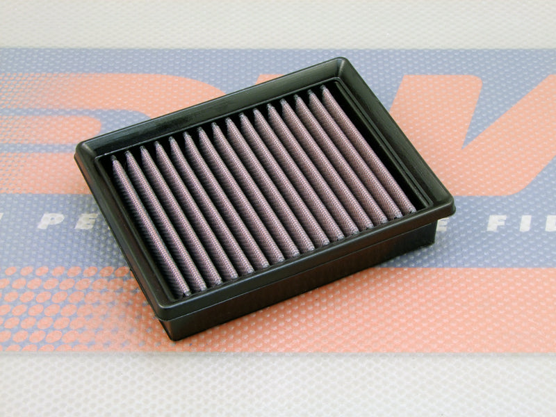 A Motorcycle air filter, with pleated media and a black PU frame, shown on a DNA logo themed mat. 