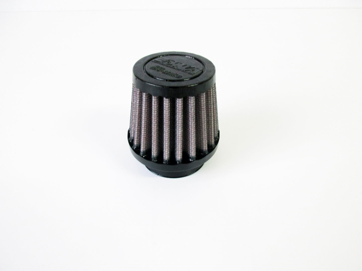 A small cylindrical universal air filter with a black top cap and pleated filter media, shown on a plain white background.