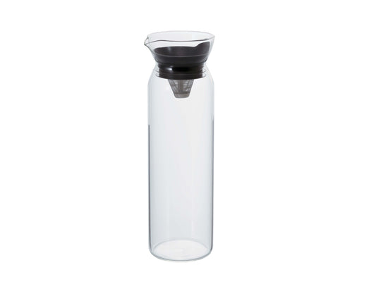 A tall, clear glass pitcher with a black and mesh filter, and pour spout, shown on a plain white background.